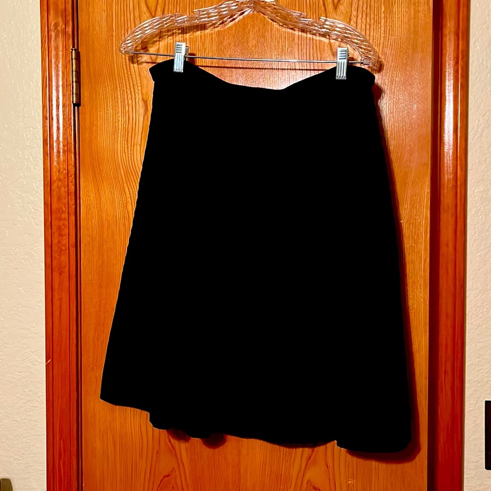 Black CAbi knee length skirt.